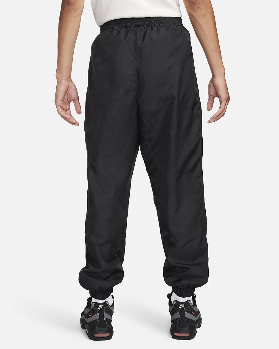 Nike Sportswear Men s Woven Trousers. Nike CA